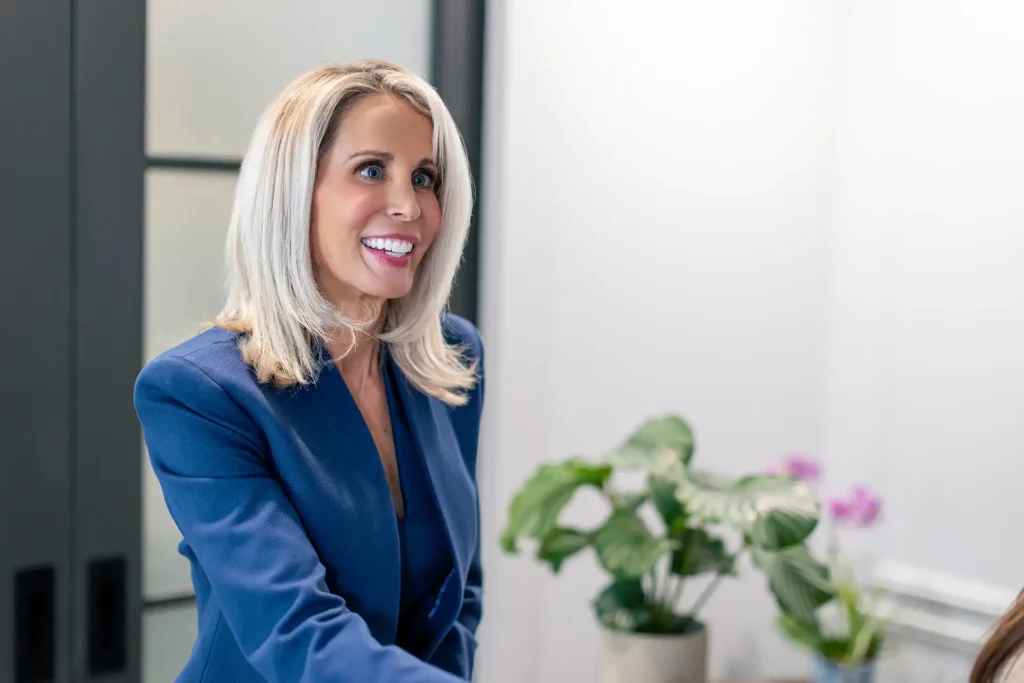 rebecca franklin harris shaking hands with a client