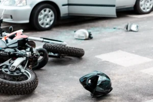 overturned motorcycle on the ground after an accident